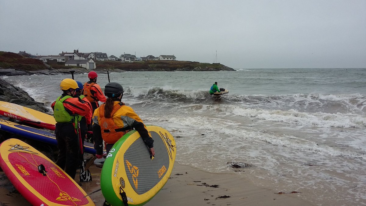 Braving the surf on the SUP training @PlasyBrenin #Anglesey