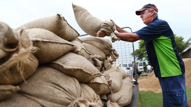 couriermail's tweet photo. Full list of sandbag locations in southeast Queensland https://t.co/afzstxbMQK #bigwet #QldWeather #Bneweather https://t.co/embJtg3CVp