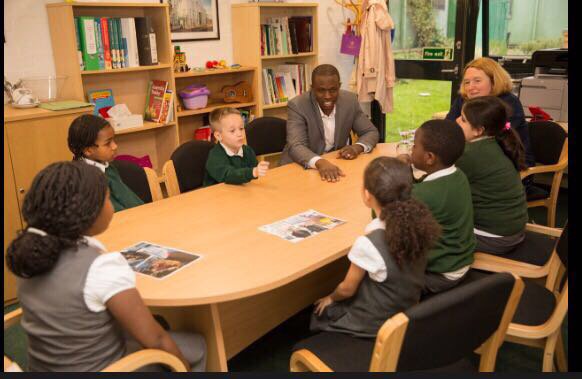 Dandor CEO with the children and headteacher of Nightingale Primary school in Hackney discussing the Batman publicity events best picture!