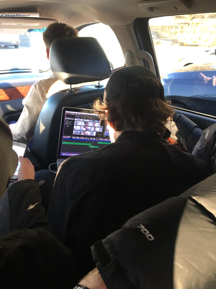 AndreaRussett's tweet photo. we're packed into a car w 9 people and david is steadily editing. i wish i was that passionate about literally anything in my life https://t.co/nSinZzr7wP