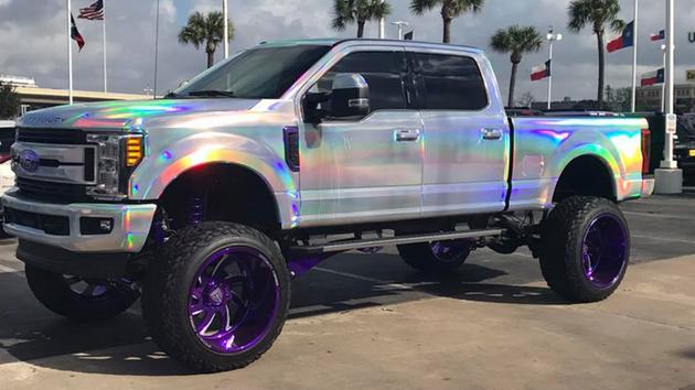 TXWWHEELS's tweet photo. Custom Lisa Frank truck(rainbow-wrapped 2017 Ford Super Duty pickup truck) #superduty #custompickup https://t.co/Zgvi7vtfOE