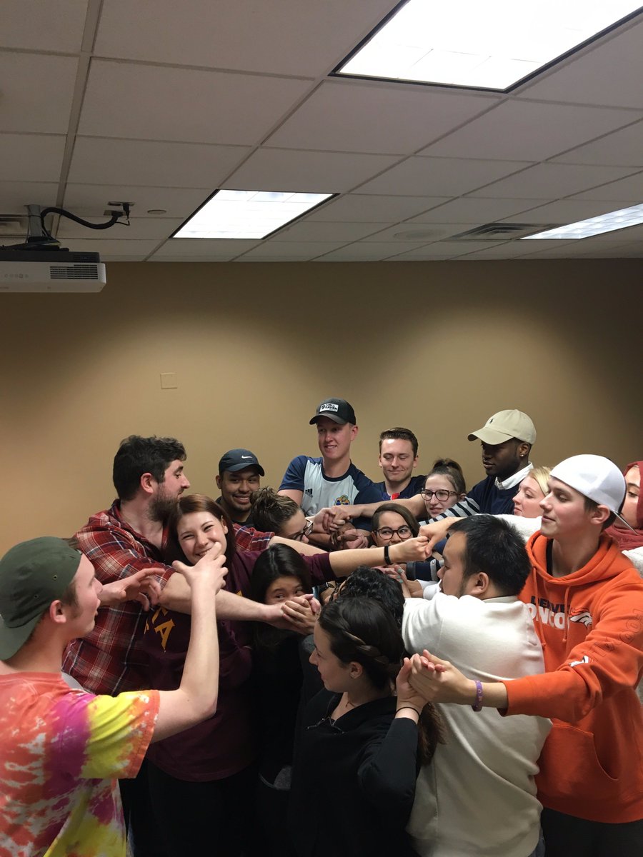 Practicing leadership with a human knot activity in Dr. Stephanie Galarneault's Introduction to Small Group Communication class!