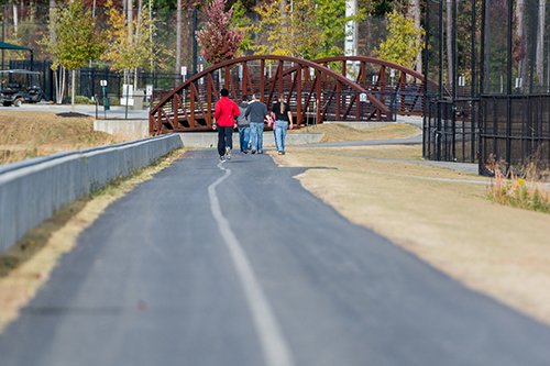 parkingatksu's tweet photo. It’s #NationalTakeAWalkintheParkDay! Take the #BigOwlBus over to @KSUStadium & enjoy the trails. https://t.co/rjYKzp9tAz