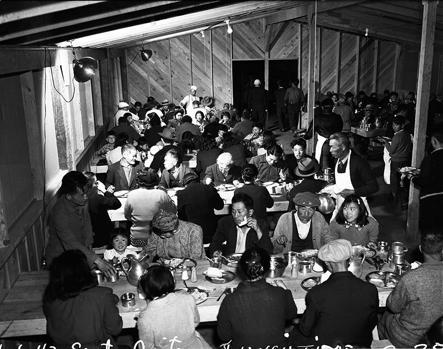 FDRLibrary's tweet photo. People confined in the “assembly centers” waited in lines for meals in communal mess halls https://t.co/Wd8kmBAHfp #EO9066 #WWIIStories https://t.co/uGReypTk2z