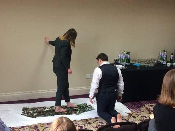 Mts2016Finance's tweet photo. Brave @nhslothian Finance Staff walking across broken glass by tackling the problem one step at a time! @ScotFFF #CIPFAScot https://t.co/aZk0Ofwqnp