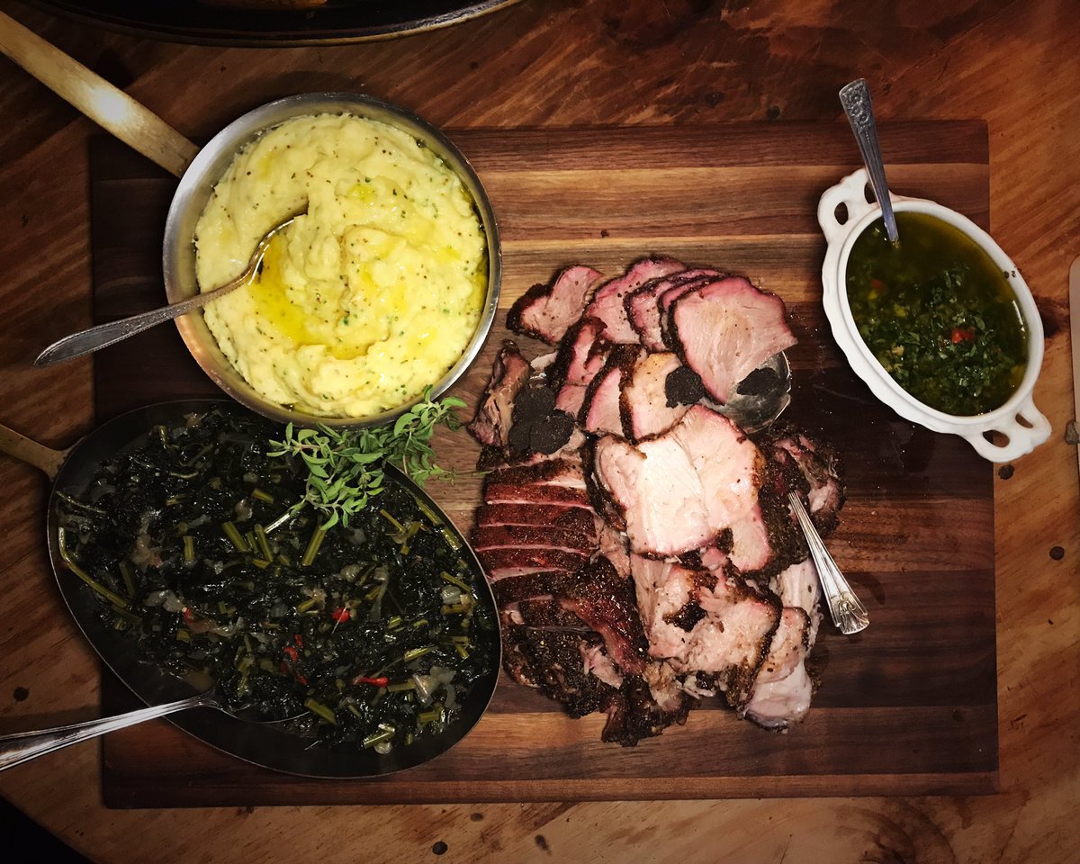 TheFacinator's tweet photo. supper with @tylerflorence and @tolanflorence  Smoked pork with black truffles, braised kale, mashed potatoes. smoked on the @TraegerGrills https://t.co/JappBq1Gve