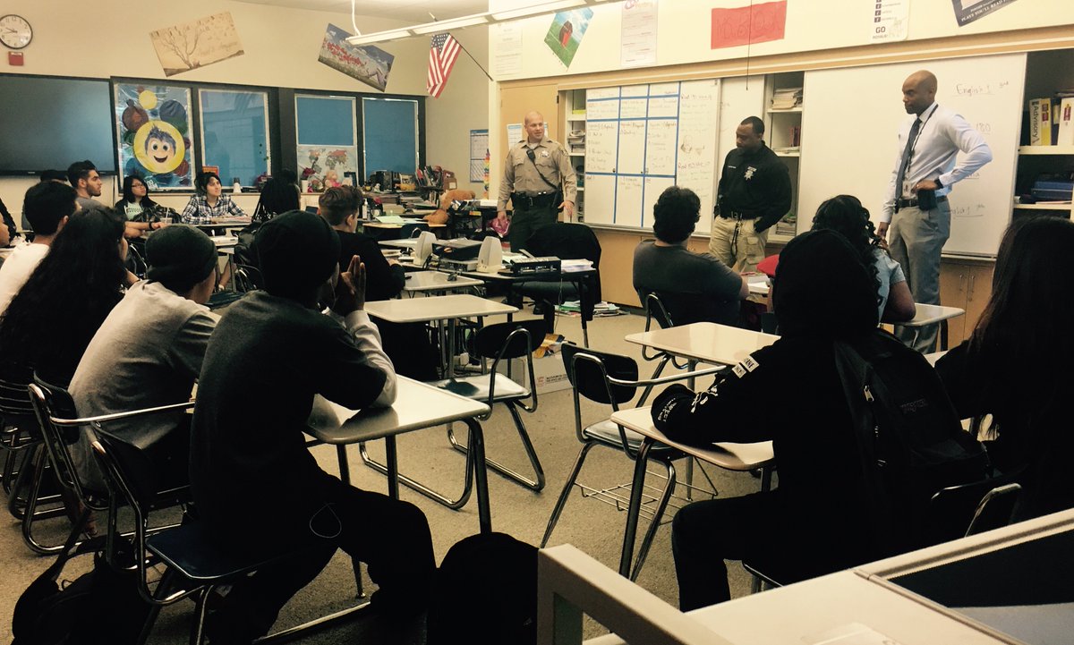 SCCoSheriff's tweet photo. Deps. Barajas Simpson &amp; Cooks met w/ HS students to discuss law enforcement &amp; race relations. Deps helped students draft essays on the topic https://t.co/Szj4h5rUvX