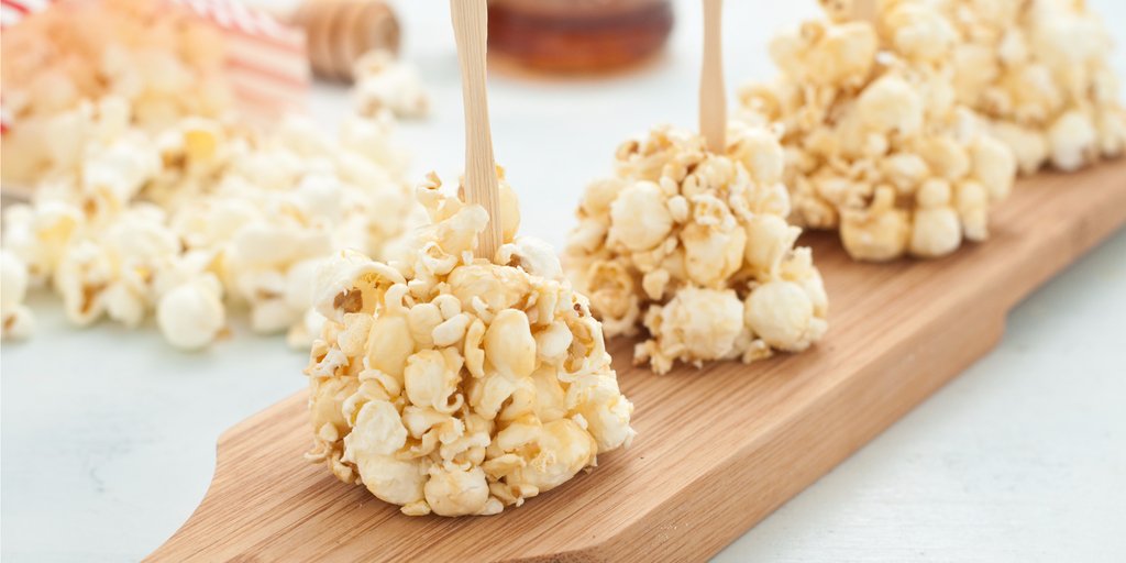 Feeling fancy with your popcorn? Try making some Poshcorn balls with a little drizzle of honey!