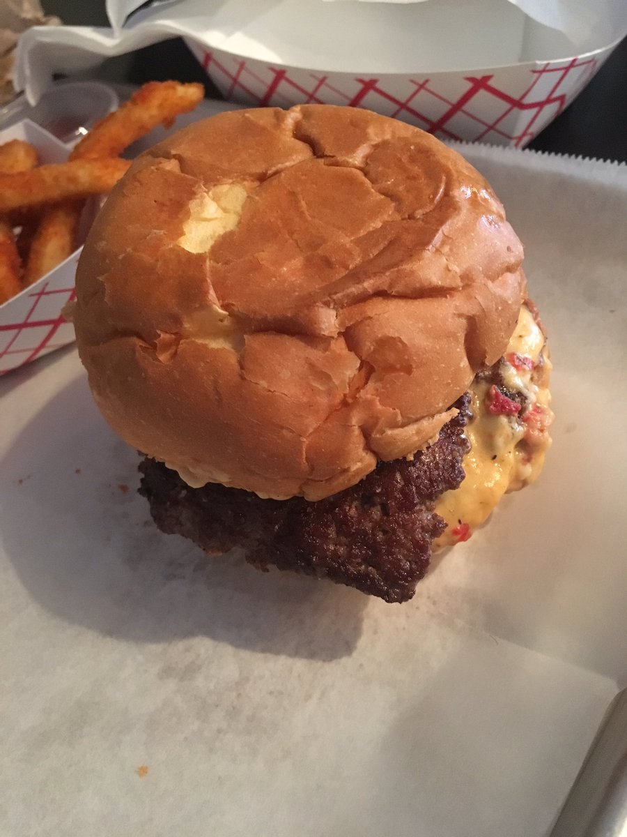 HumanSpacesSTL's tweet photo. Pimento cheese burger with chow chow and pickledfried green tomato. OMG. 😲 https://t.co/yzQA1pW5hc