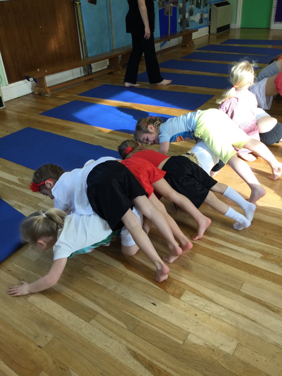 Yoga fun today - crawling through a tunnel of downward dogs!