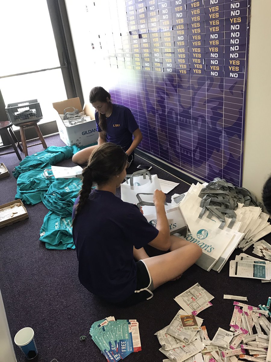 geauxteal's tweet image. Busy stuffing bags with @LSUsoftball. They love giving back. #Made2Give #Made2Fight