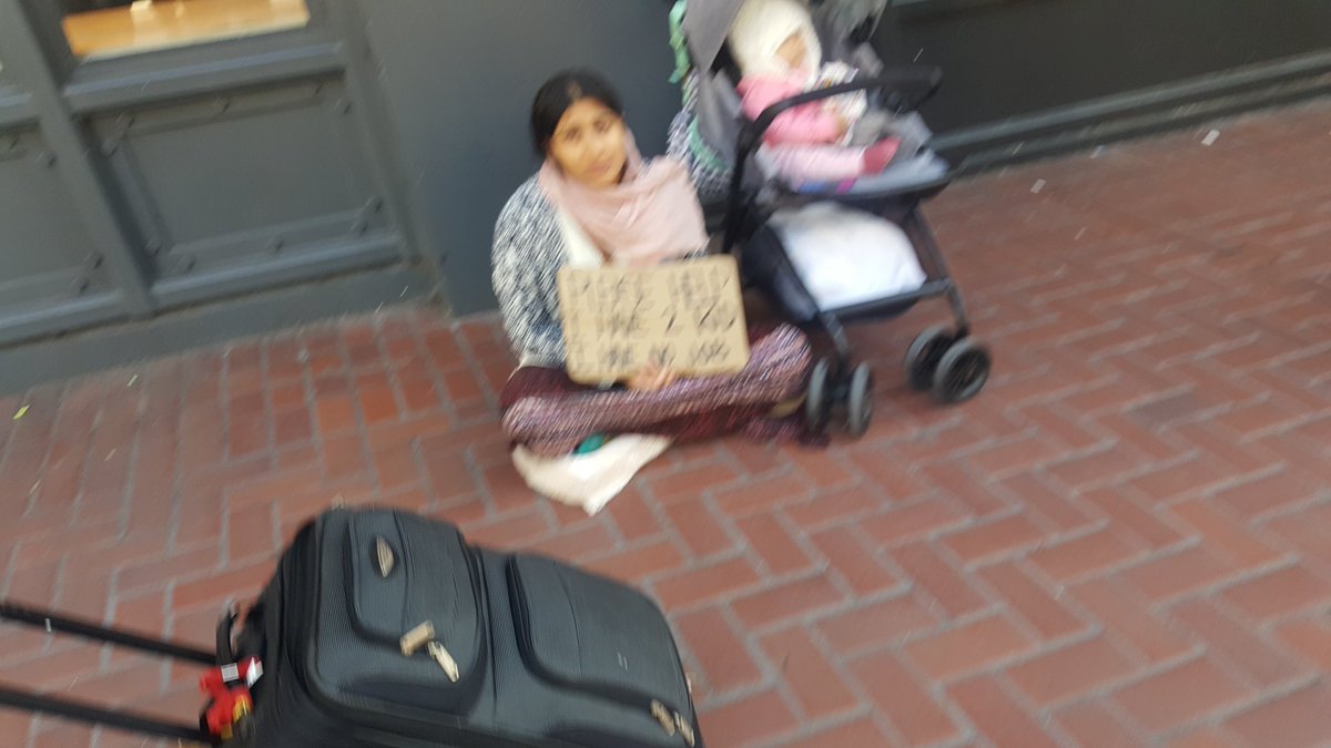 kasey_alan's tweet photo. This is also on Market in San Francisco. She sat down and people started lining up to give her money. https://t.co/4qX226ckeV
