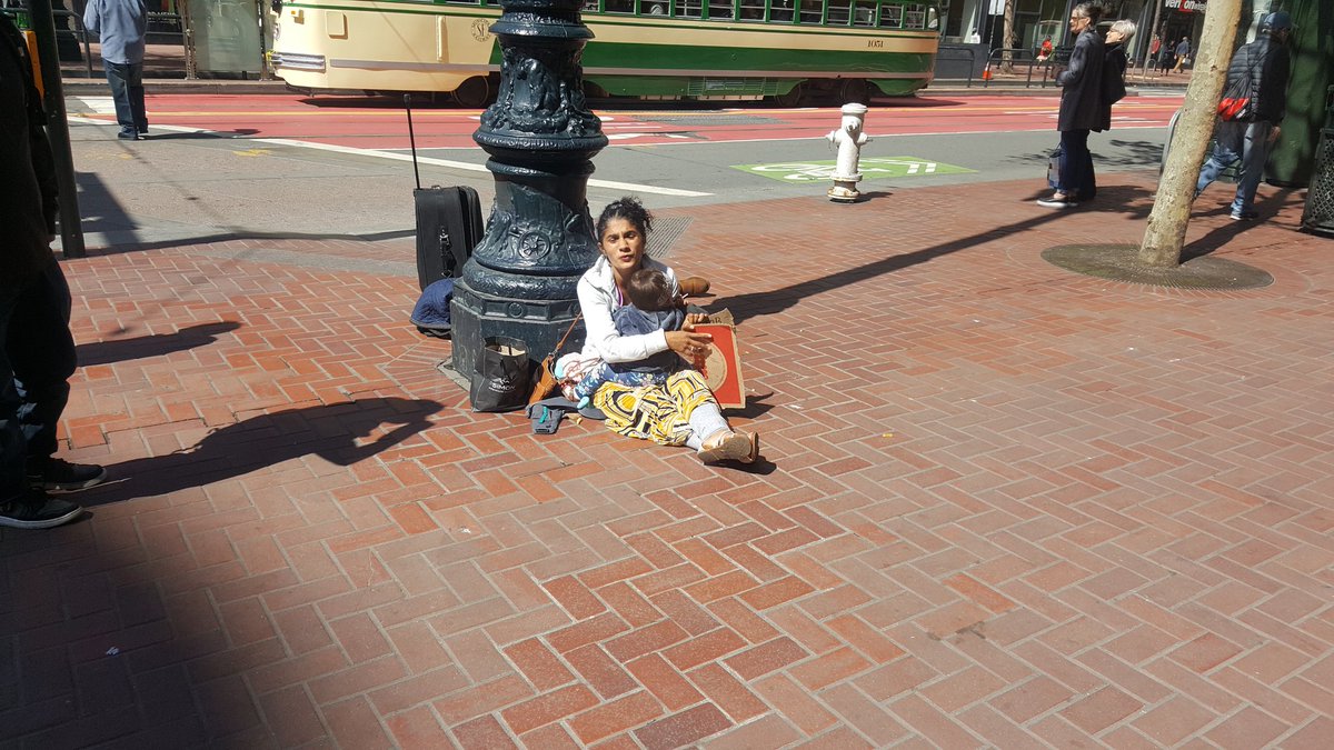 kasey_alan's tweet photo. This is on Market St San Francisco. Another woman using her child to beg. Is this right? https://t.co/UyvXXN9fTM