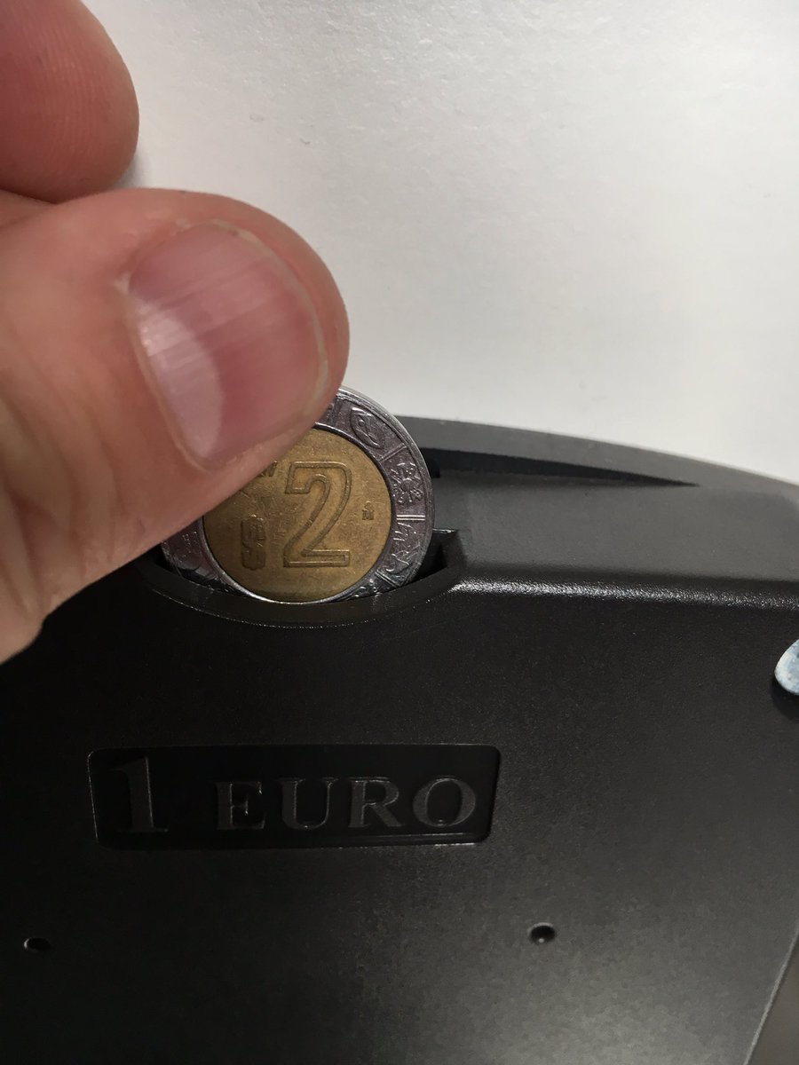 Using a 2 Peso coin instead of a Euro for a locker.