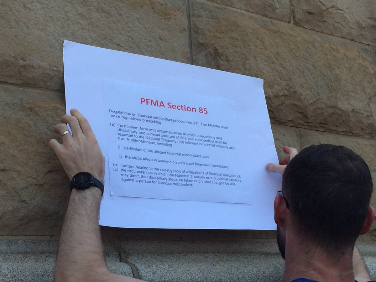 OUTASA's tweet photo. Employees posting section 85 of PFMA on the walls of Treasury #handsofftreasury https://t.co/u0agdAuouh