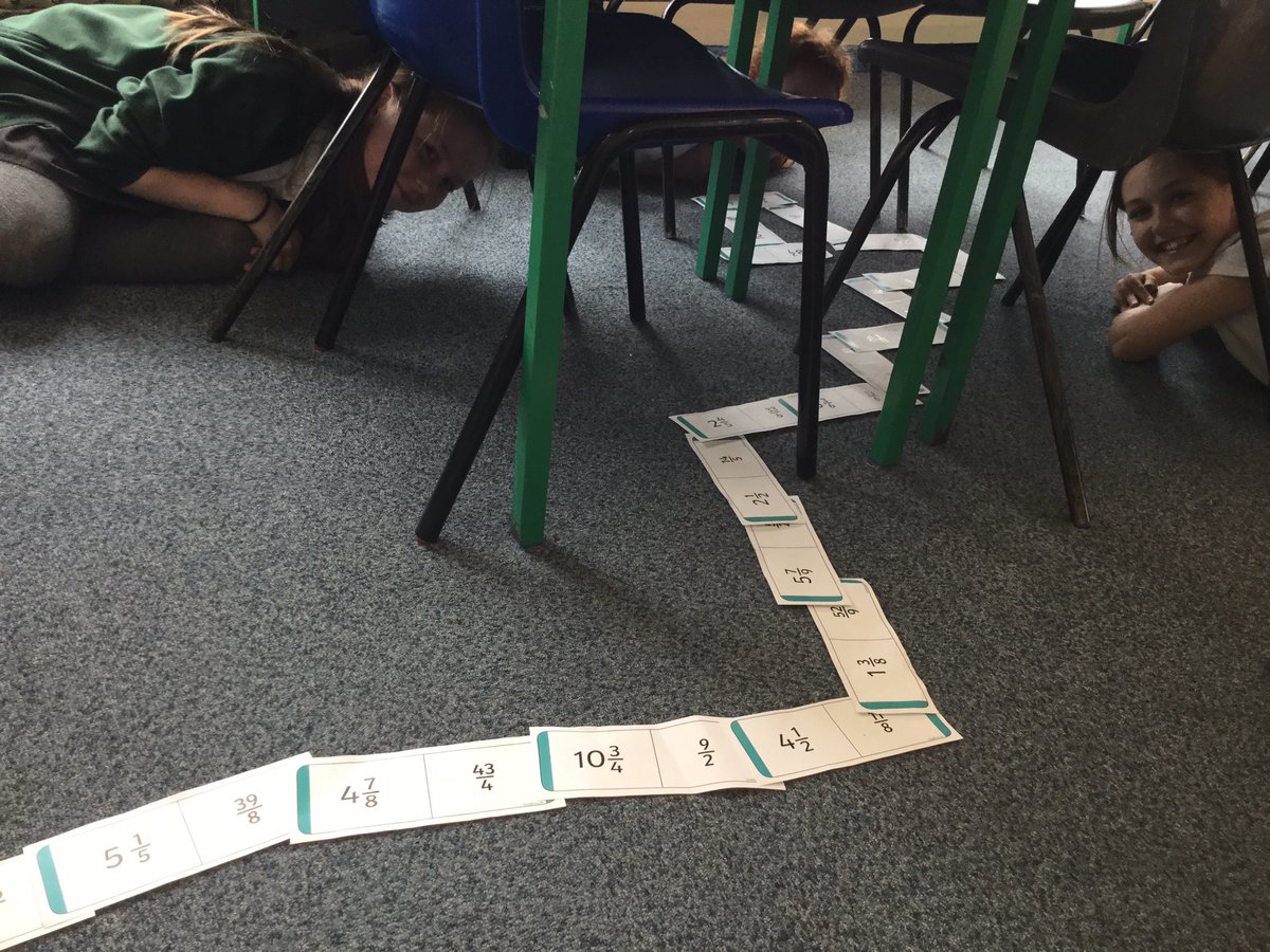 LyndonGreenJnr's tweet photo. 'Under the table' maths in 5L!!! We have been converting improper fractions to mixed numbers in a game of dominoes. #crazyclass https://t.co/SoFy0eDrHy