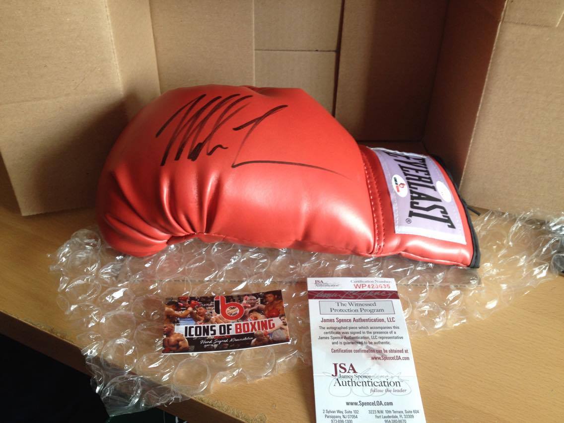 TrackDigitalM's tweet photo. Received my boxing glove signed by @MikeTyson. Thanks to #Iconsofboxing for donating the glove to raise funds for #Parkinsons #lovestaffs https://t.co/JUvFMQkVTp