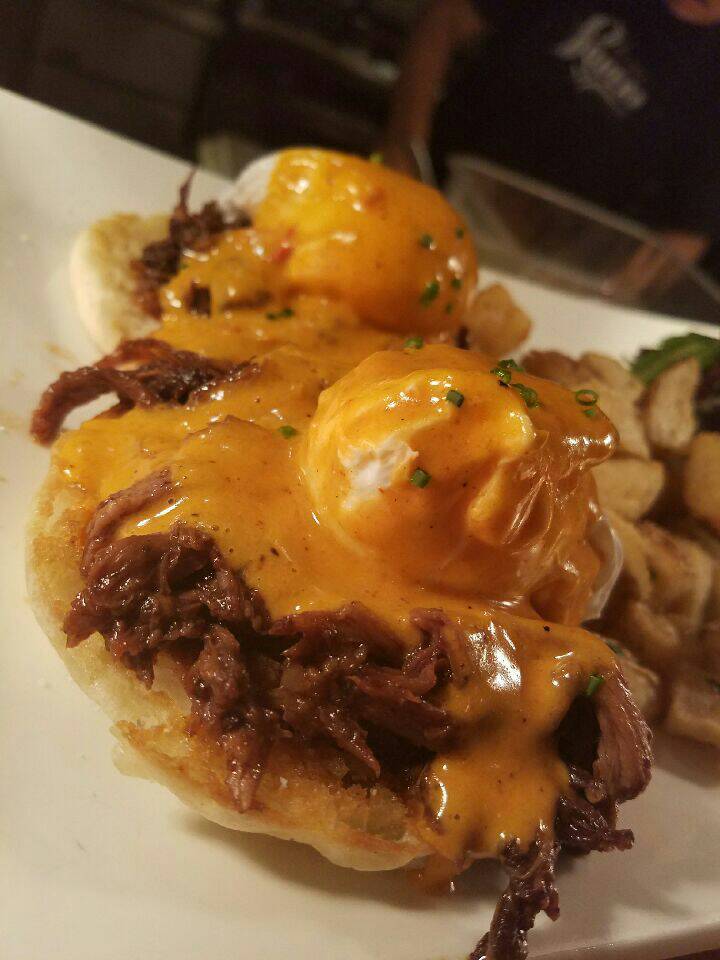 Lamb Neck Benedict. Slow roasted Moroccan lamb neck and harissa hollandaise. Get it this weekend. #brunch
