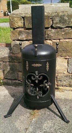 <a href="/ReckageAtHome/">Reckage</a> steel log burners by Iron Art