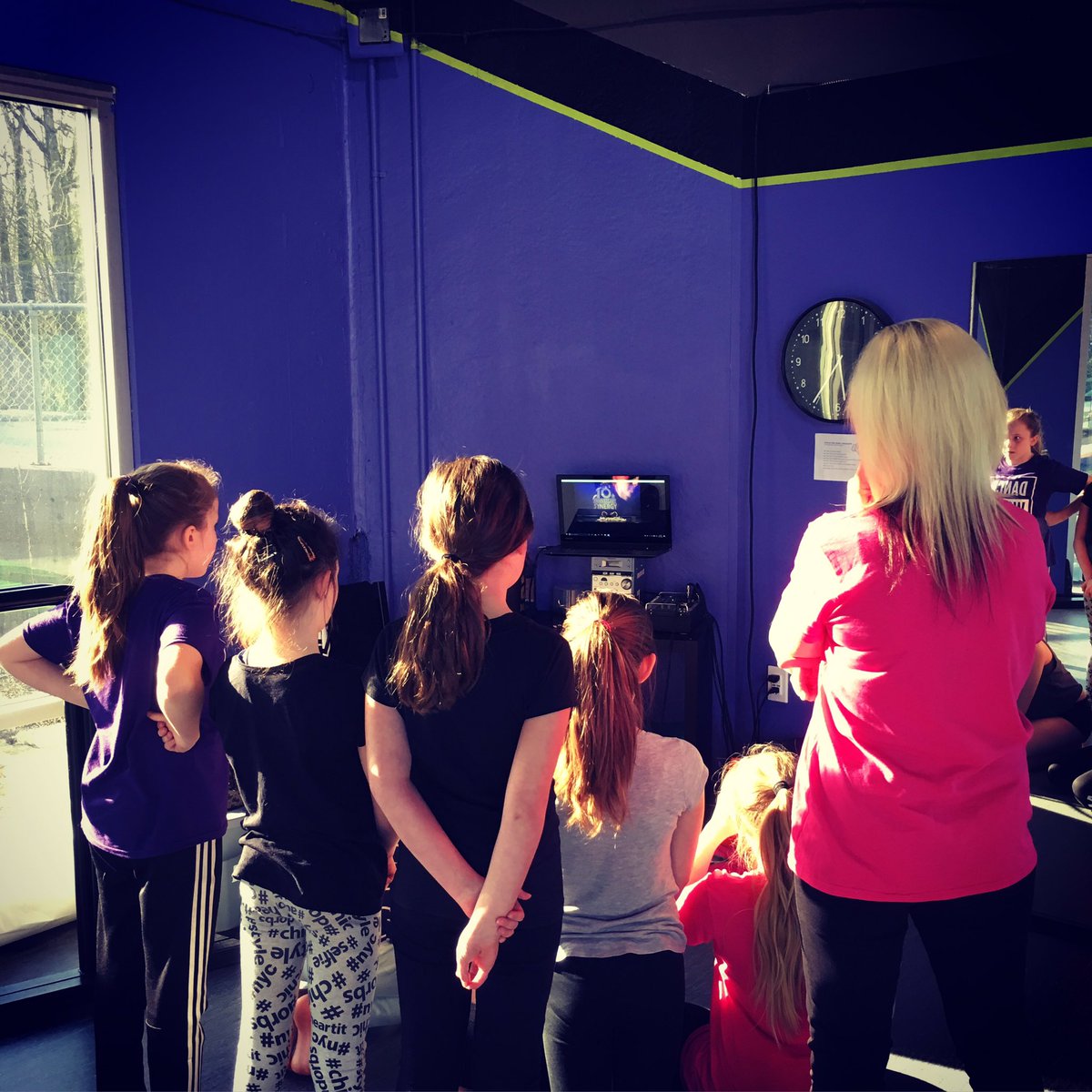 DXdanceworx's tweet photo. Junior Acro checking out their video adjudication from Synergy Mission! Such a great learning to for these guys! #dx https://t.co/xKwPeK11QL