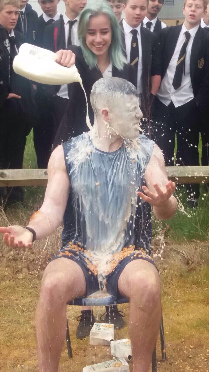 Bottle flip challenge was a great success to raise money for SHINE today! Some say Mr Choudhury still smells of milk!! #SwimmingCapGirl