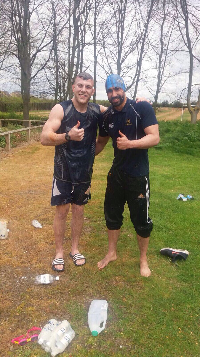 MeridianPE's tweet photo. Bottle flip challenge was a great success to raise money for SHINE today! Some say Mr Choudhury still smells of milk!! #SwimmingCapGirl https://t.co/m9x9kRIHiu