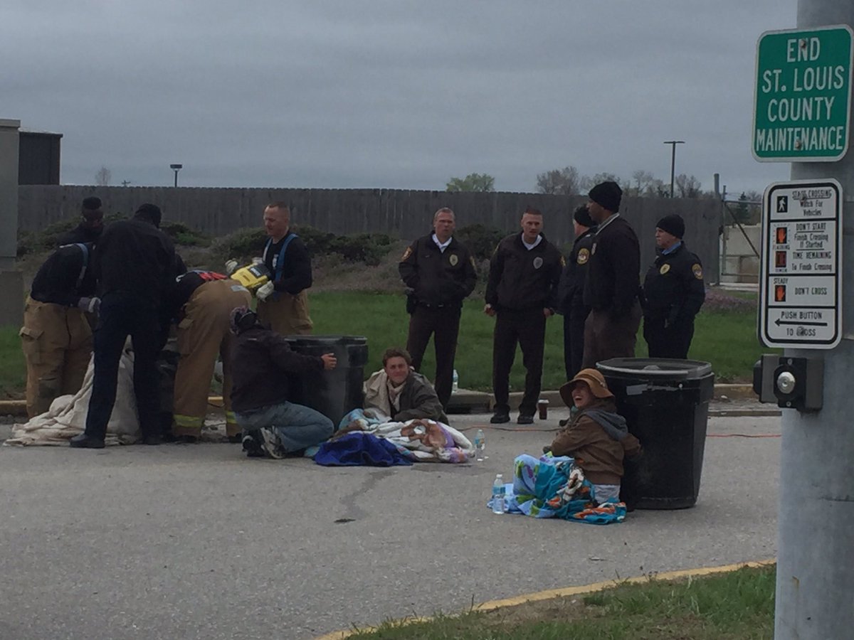 KWRose's tweet photo. Police have started cutting out the second group of 4 protestors. #WestLakeLandfill has been SHUT DOWN for 9.5 HOURS and still more to go! https://t.co/lop51QCbja
