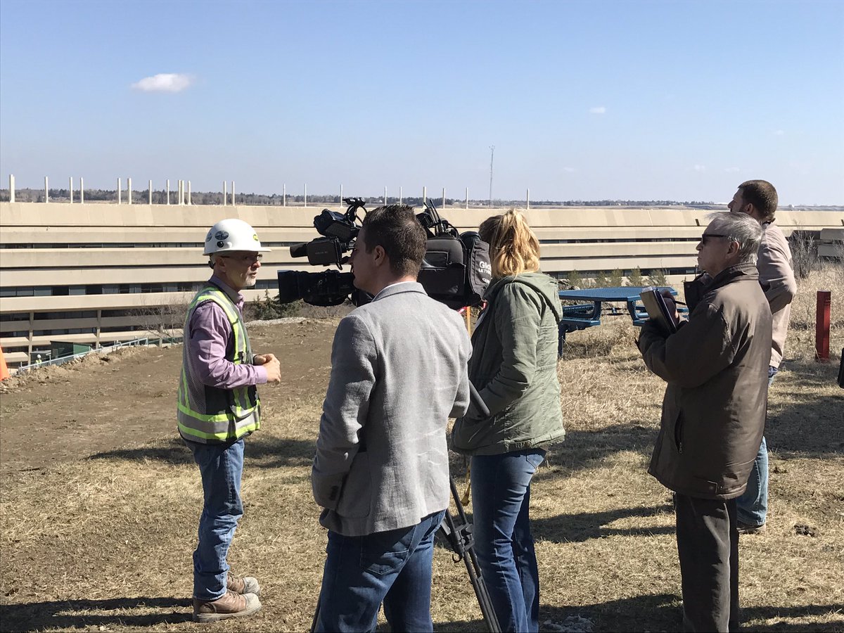uLethbridge's tweet photo. Media tour at the #DestinationProject @PCLConstruction Snr. superindentant Daryl Campbell describing current progress on site! @AB_AdvEd https://t.co/YHnHZmMnbj