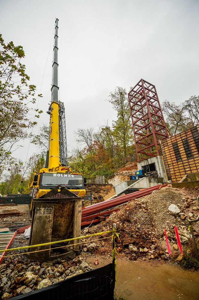 crystalbridges's tweet photo. Dinosaur finds halt construction on new elevator tower. https://t.co/FzTAr6DMyw https://t.co/rZRlKeIAA4