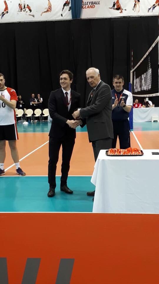 Jake Welch picks up his National Young Official of the Year award from Volleyball England at The National Volleyball Centre.