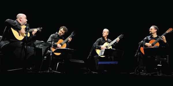 What has 36 guitars, is inspired by Havasupi song, and has only been heard once? 
“By Chants”! Performed By the Los Angeles Guitar Quartet.