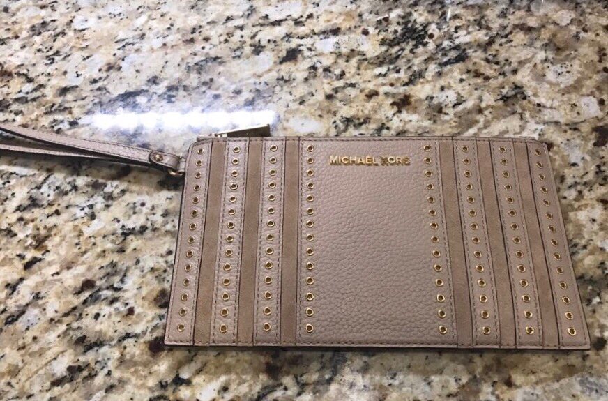 Excited to announce that we are raffling off a Michael Kors wristlet this year at campout! $2 for 1 ticket $5 for 3 tickets.