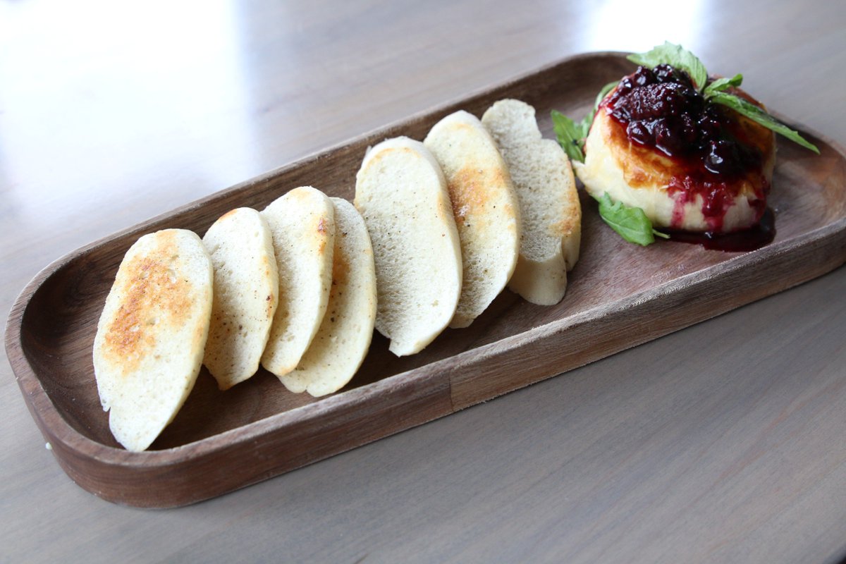 Phyllo Wrapped Danish Brie, Mixed Berry Compote, French Baguette, Arugula. #CuredWineBar

#yeg #yegfood #yegfoodie #yegdatenight #yeglocal