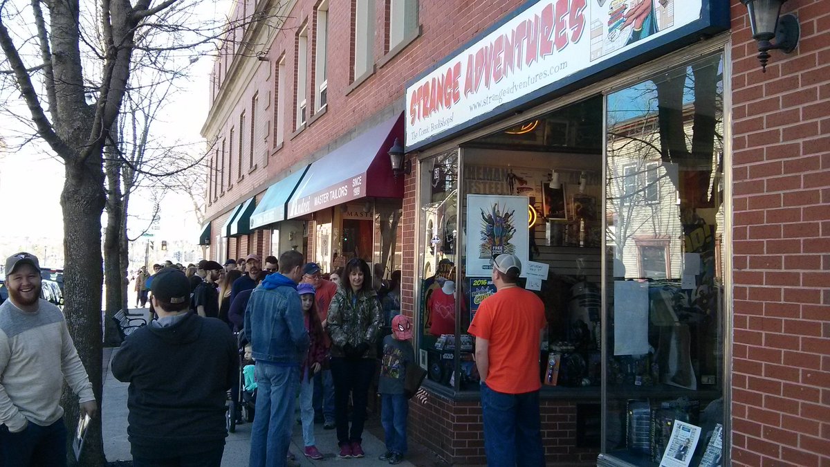 ozwalled's tweet photo. @Freecomicbook For #FCBD17, I'll be going to @StrangeNB! #RoadToFCBD Here's a pic of last year's line. Good times. :) https://t.co/xkf3ukmTJw