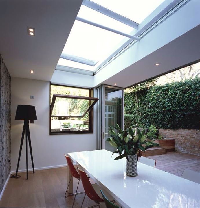 A timber-clad extension. The bi-folding doors completely open up the extension to the patio area by Seary Architects. #design #architecture
