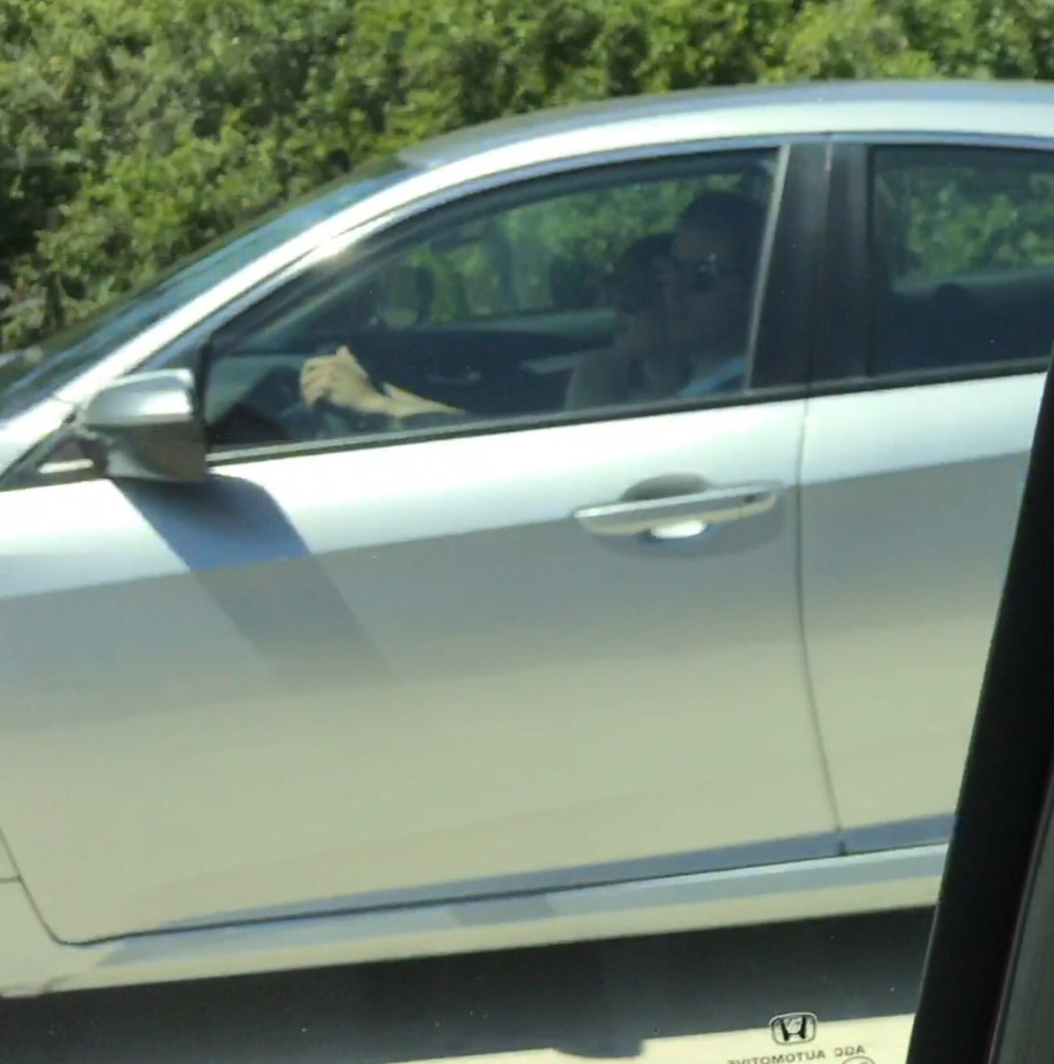 Followed a cute couple on I95 in Cocoa FL for about 10 miles. Her head kept disappering in his lap.  #roadhead