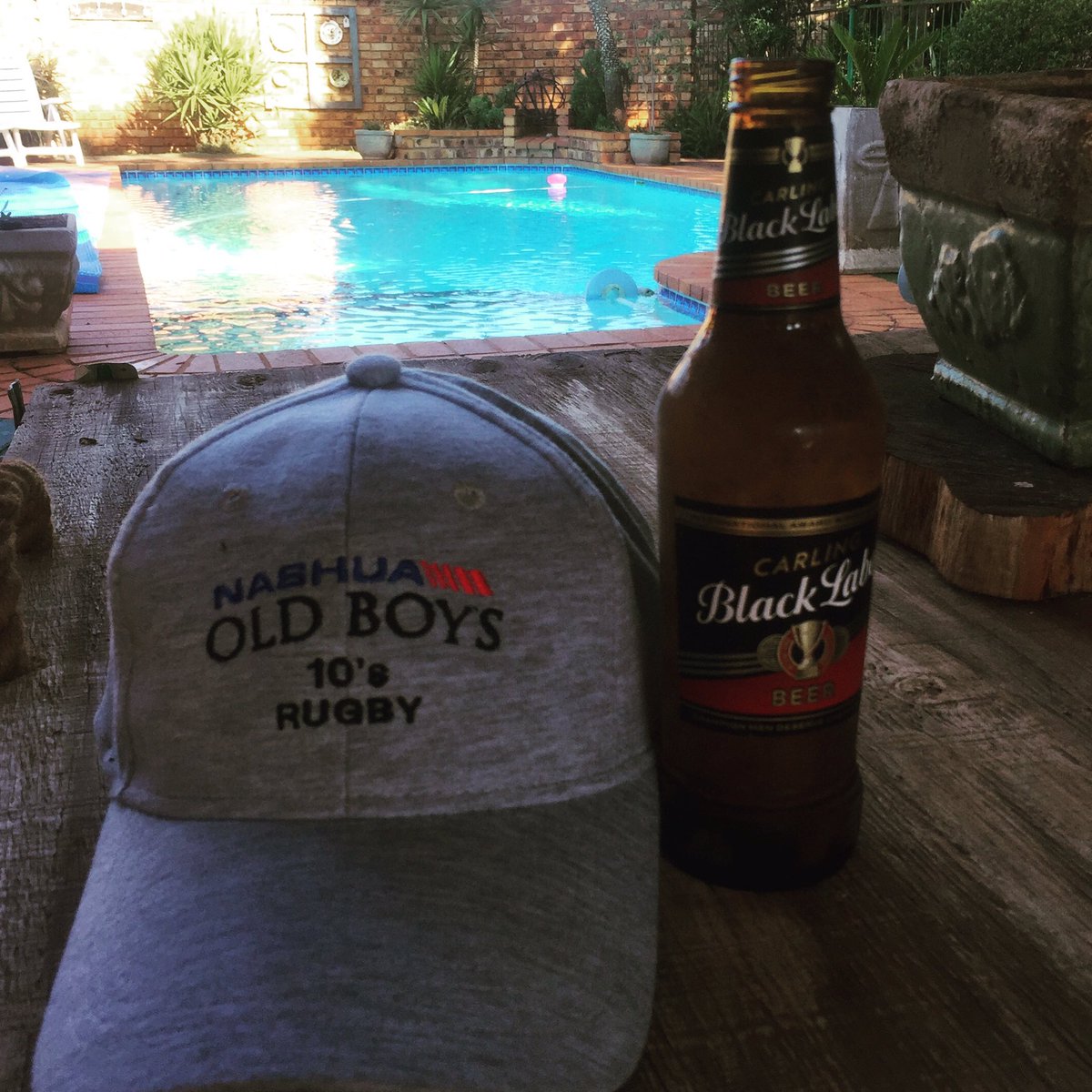 mobrugby's tweet photo. Relaxation time for #obcap with a ice cold @blacklabelsa #pool #beer and sevens #rugby https://t.co/2GWMzPus6G