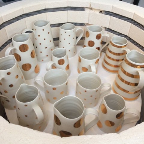 luna_lighting's tweet photo. Real gold lustre tableware in the kiln #behindthescenes #kiln #goldlustre #tableware #goldpatterns #jugsandmugs #tablesetting #handpainted https://t.co/l37b6gHBsw