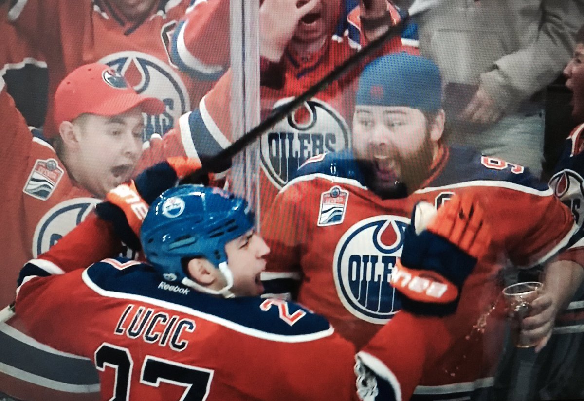 DaveRandorf's tweet photo. Don't know the dude in blue hat. But he pretty much sums up how #Edmonton is feeling right now.  Great  atmosphere last nite. #Oilers https://t.co/HiuULrvEmD