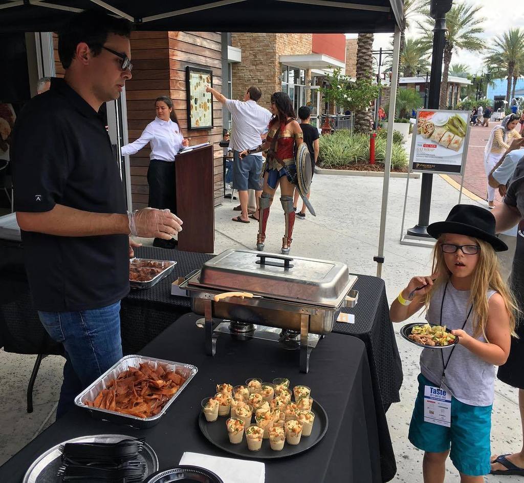 CentralFLTop5's tweet photo. #Taste360 @PFFUSA is serving hummus, Fattoush Salad, Falafel &amp; a delicious chicken shawarma! Wonder Woman is also … https://t.co/SfiKXShKNg https://t.co/Lr9Td2eZo0