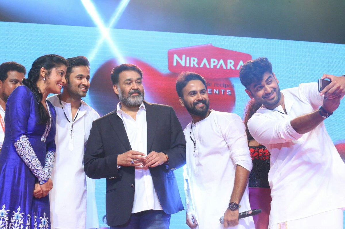 SshivadaOffcl's tweet photo. #Achayans muvi 🎼 launch,Happy to be part of dis team.Blessed to share stage with legendary #Lalettan
Spl thanks to #Ashwin for de costumes.. https://t.co/Bleir5HKJf