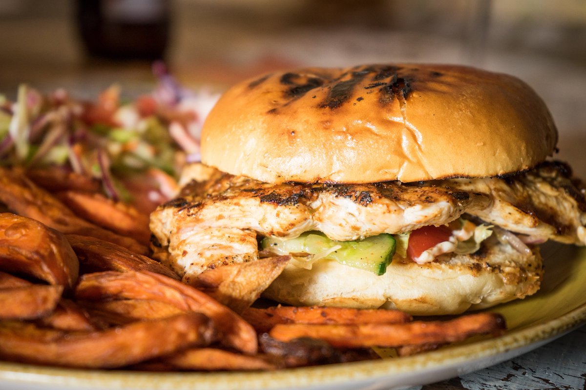 RootsRumShack's tweet photo. Jerk Chicken Burger for Lunch? #RootsRumShack #JerkChicken https://t.co/95udUgtLe3
