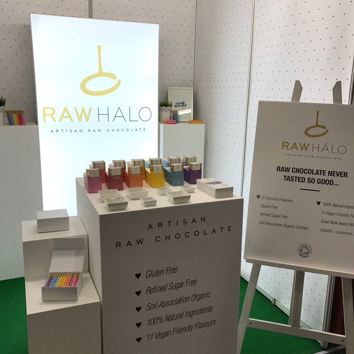 ExhibitGroup_UK's tweet photo. Check out this lovely @RawHaloUK stand at @NatProductsShow. There is still time to visit! #exhibition #eventprofs #fabricframes #chocolate https://t.co/4GeDBRIBDS