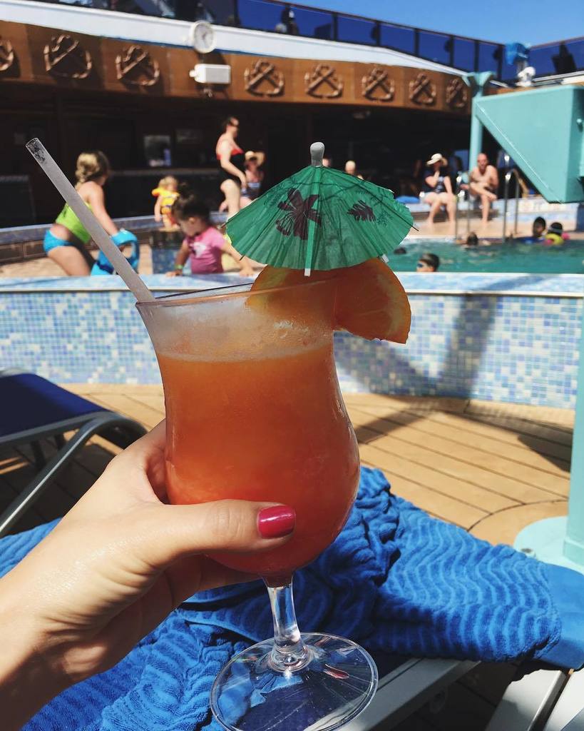 cristencasados's tweet photo. Wishing @simplyrealmoms a fab @carnival cruise. Cheers from me to you! 🍹 #throwback #cruiselife #drinksintheair #tinyumbrella #vacayvibes https://t.co/KvPMBadkOQ
