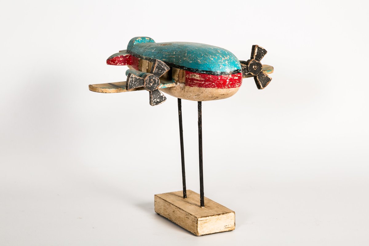 PeacockLifeIn's tweet photo. Our colorful wooden #airplanes and #helicopters make unique room decorations for a child (or adult!) who's obsessed with #aviation. https://t.co/fy2dtibXHp