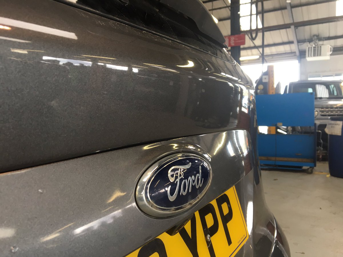 A sharp dent in a Ford Kuga tailgate and a little paintless dent removal magic by the <a href="/dent_men/">Michael & Craig</a>