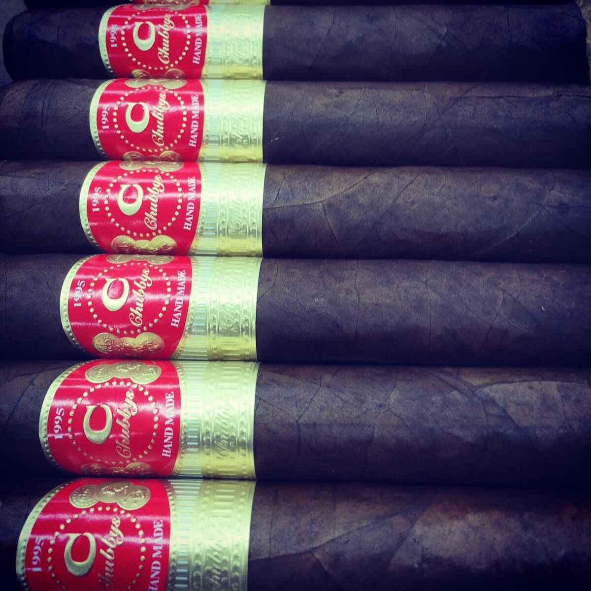CubanStockCigar's tweet photo. Opening Day is great, but a couple of #Chubbys during it is even better! #PassionForPerfection #cigarpost #botl #sotl #cigarporn #nowsmokin https://t.co/2DiLaLwJkx