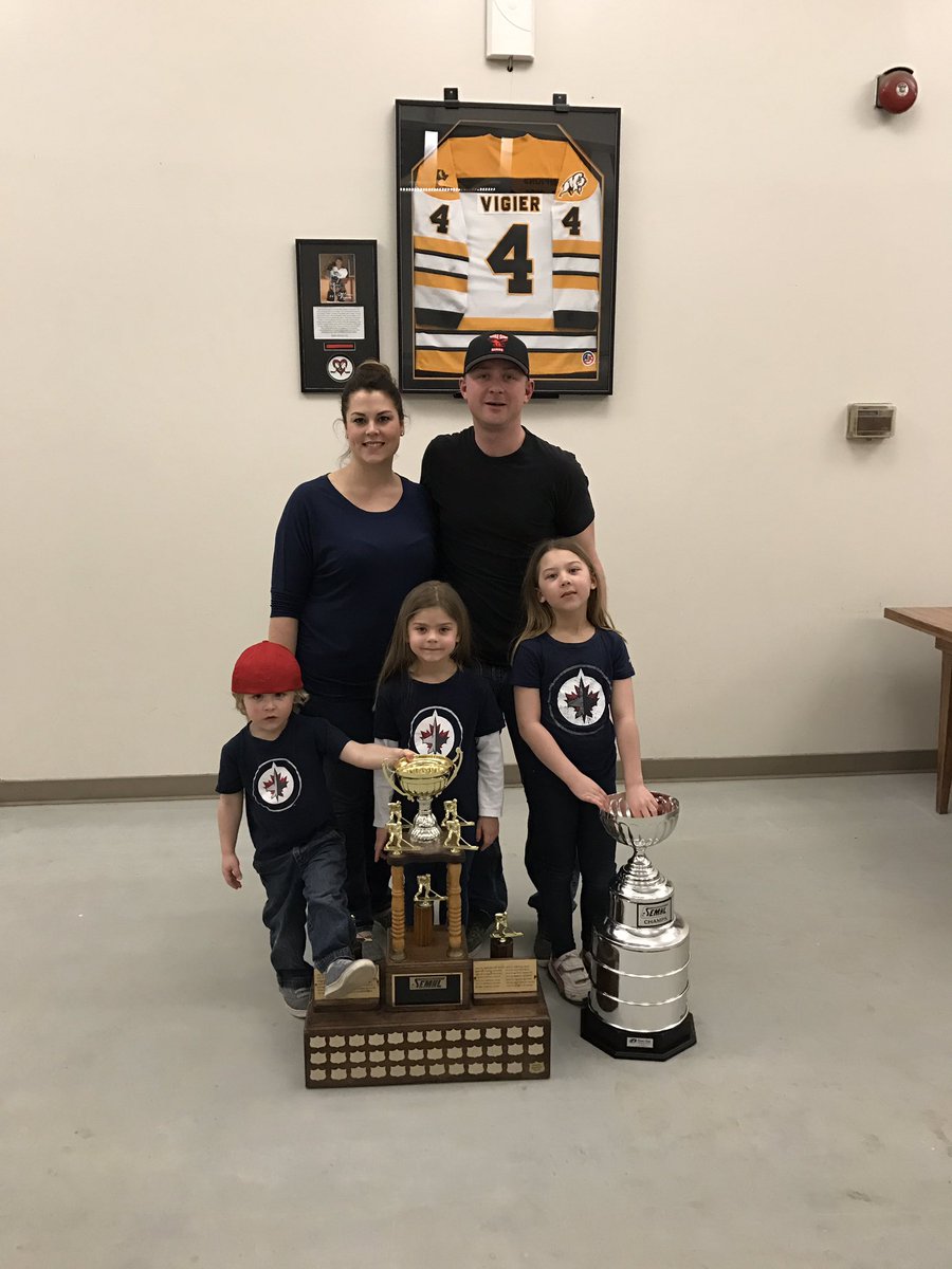 NDhawks's tweet image. Family pic with the cups. Just had to do it with Matt&apos;s jersey behind us. #MV4