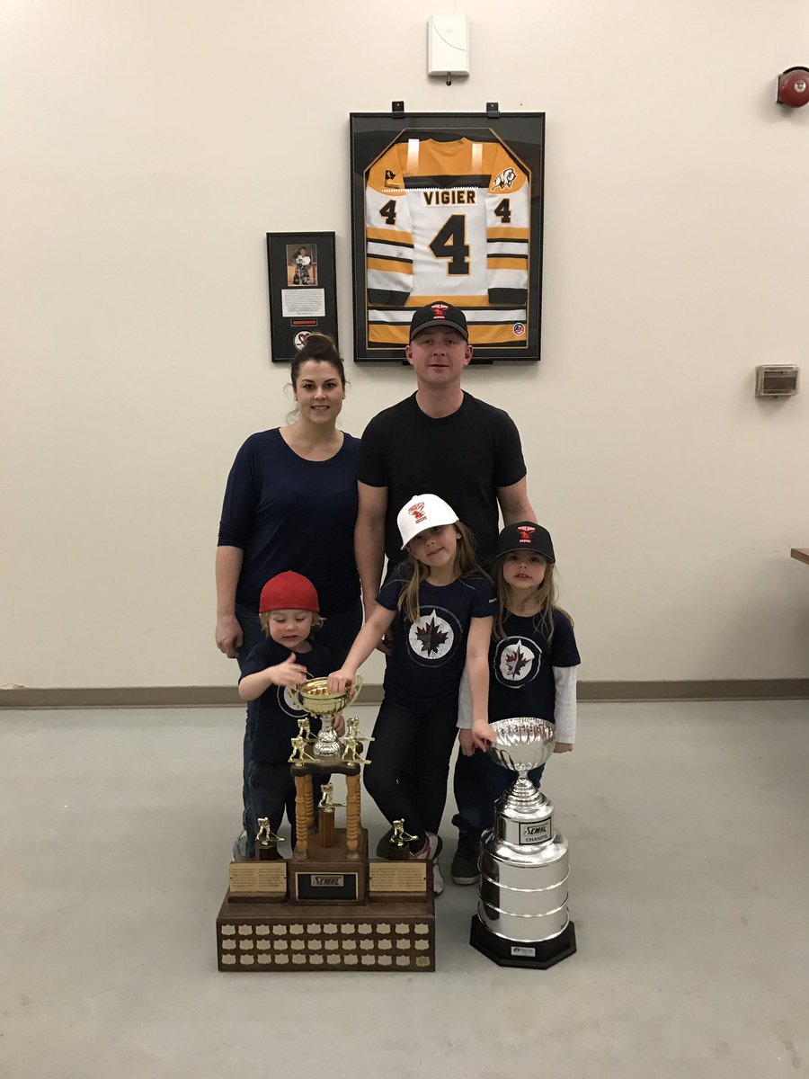 NDhawks's tweet image. Family pic with the cups. Just had to do it with Matt&apos;s jersey behind us. #MV4