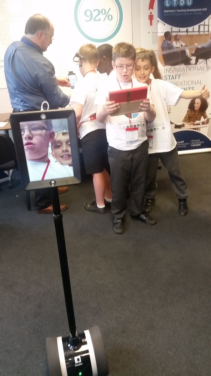 CoedGlas2018's tweet photo. The boys are controlling a robot! From @LTDU_tweets at the #YoungTeachers2017  event hosted by @DCF_cardiff https://t.co/x7iLKBLP54